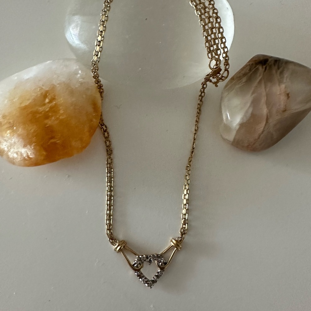 14k gold chain with small diamond chip heart